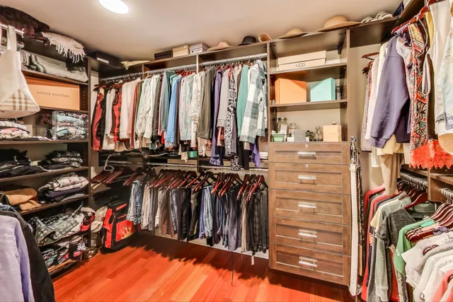 a view of backyard with outdoor seating and green space