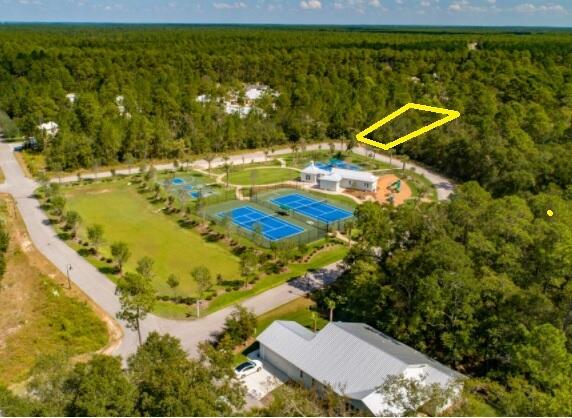 a view of swimming pool from a yard