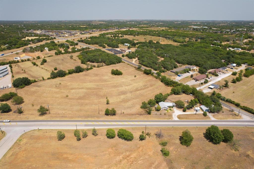 215 Zion Hill Road Weatherford, TX 76088 - Photo 10 of 12 a view of a swimming pool with an ocean view
