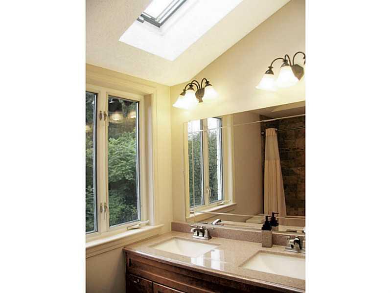 56 Holland Road Churchill, PA 15235 - Photo 15 of 25 Full Bath. 2nd floor Hall Bath has a vaulted ceiling and skylight.