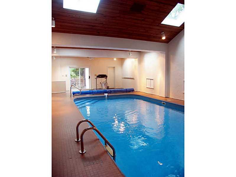56 Holland Road Churchill, PA 15235 - Photo 20 of 25 Swimming Pool/Hot Tub/Sauna. THE POOL!! Large heated pool in 27x46 heated Pool House addition has a small kitchenette area, half bath and sliding glass doors to the rear deck.