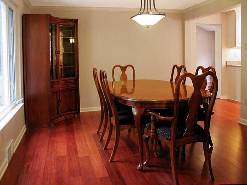Dining Room. Bamboo floors, large "Picture Window" looks out to front yard.