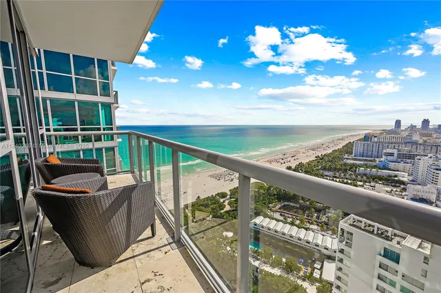 a view of a balcony with city view
