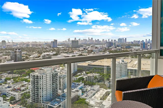 a view of a balcony with city view