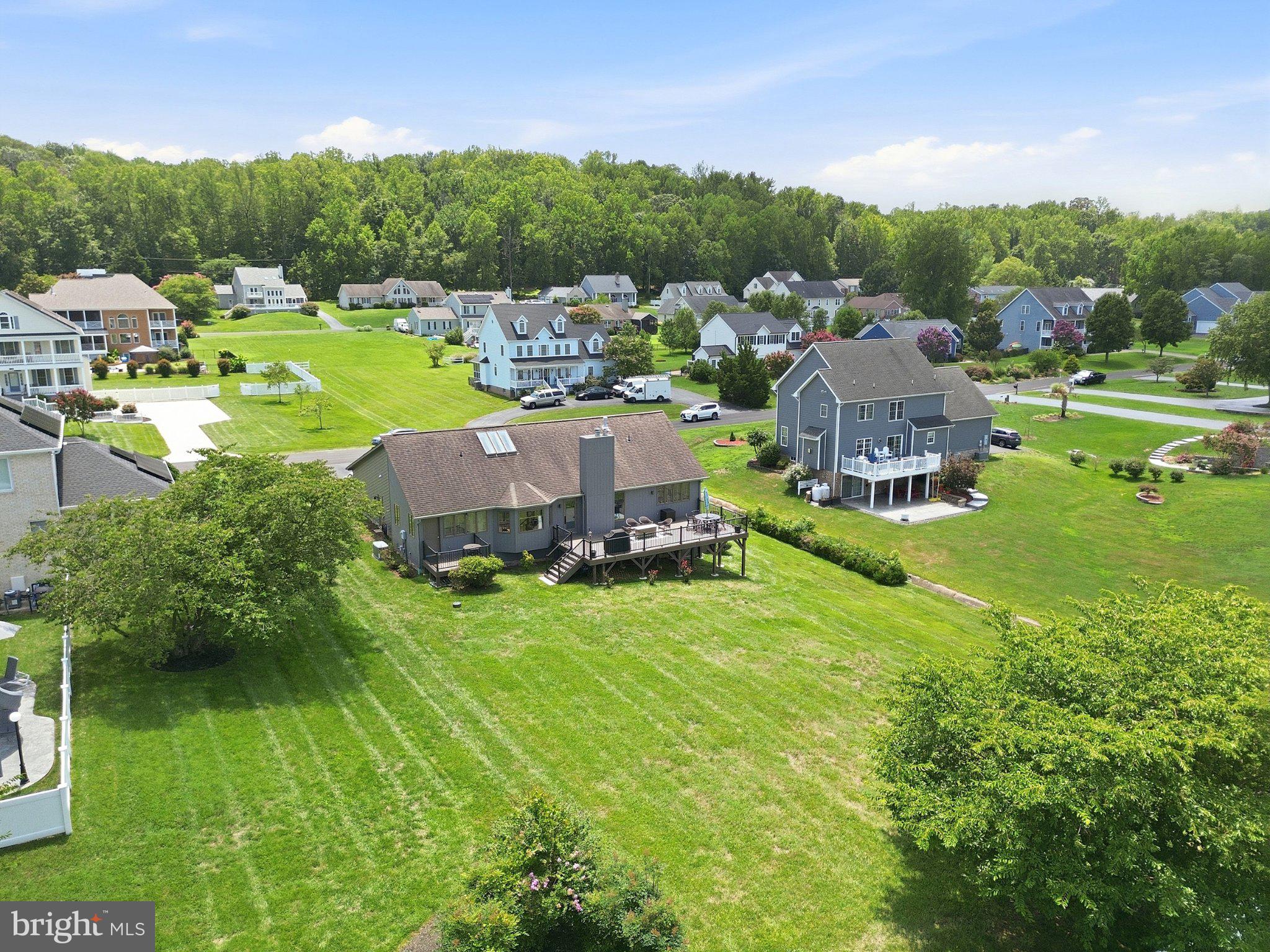 6495 Tides Road King George, VA 22485 - Photo 41 of 65 a aerial view of a house with yard swimming pool and outdoor seating