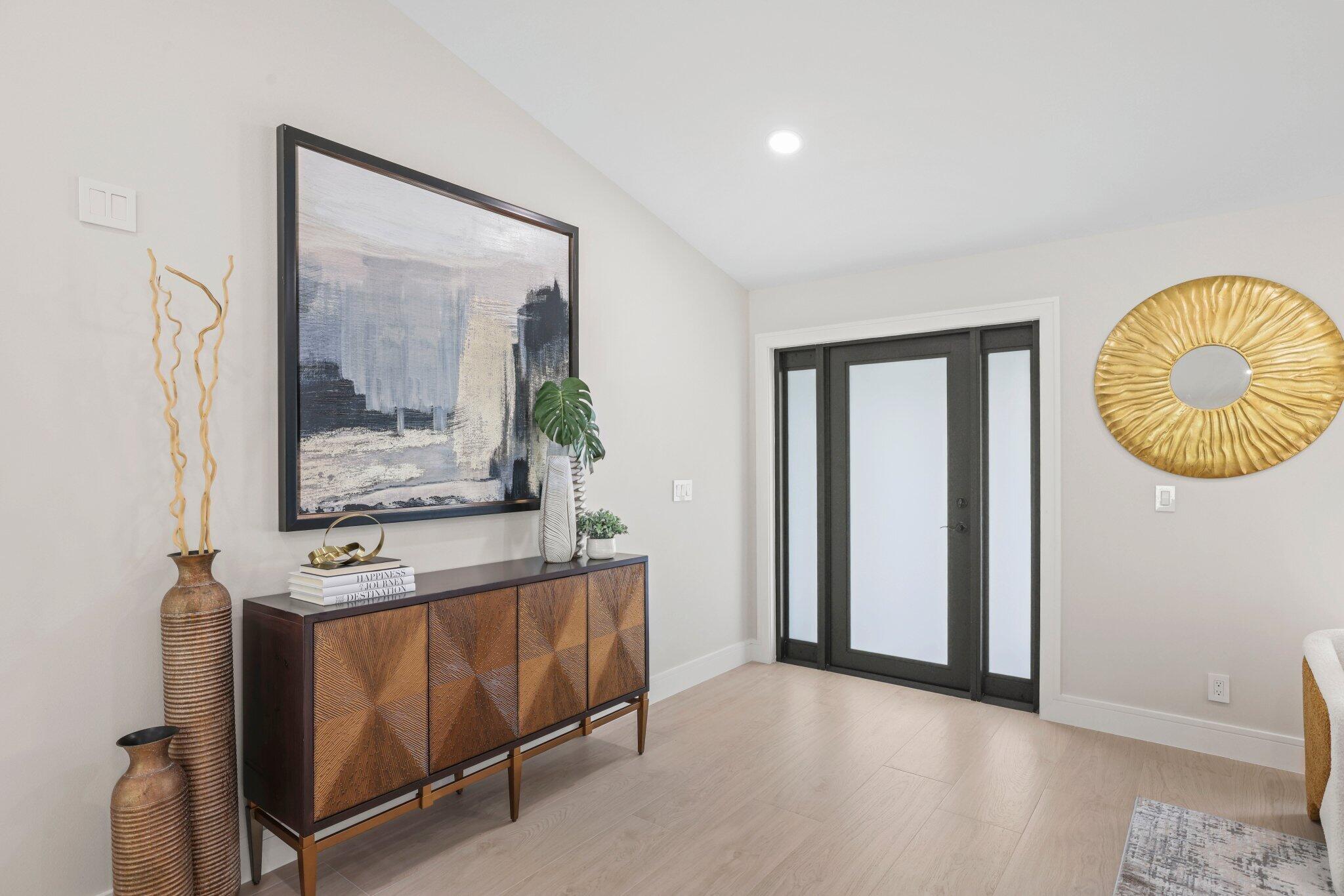 3901 Northwest 27th Avenue Boca Raton, FL 33434 - Photo 5 of 56 a view of a room with wooden floor and window