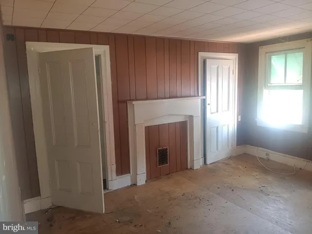 an empty room that has a window