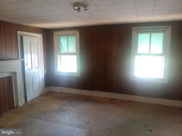 an empty room with windows