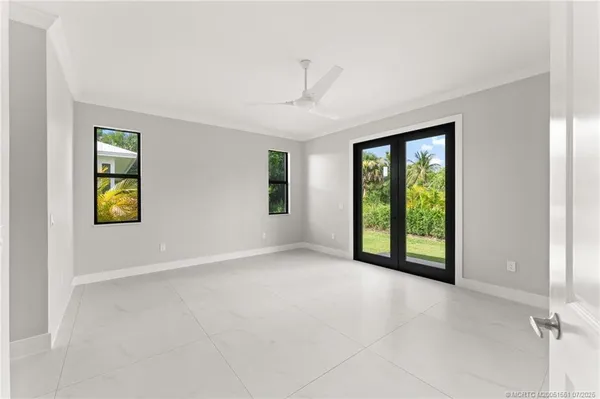 an empty room with windows and view