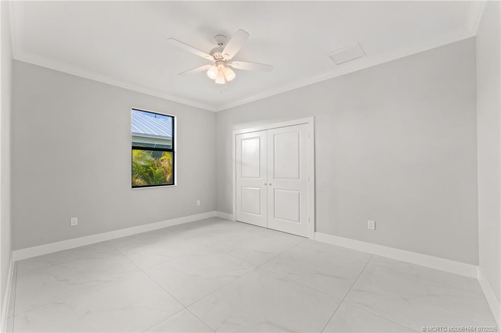 5460 Southeast Front Avenue Stuart, FL 34997 - Photo 31 of 40 a view of an empty room with a window