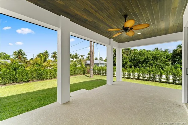 a view of a porch with a yard