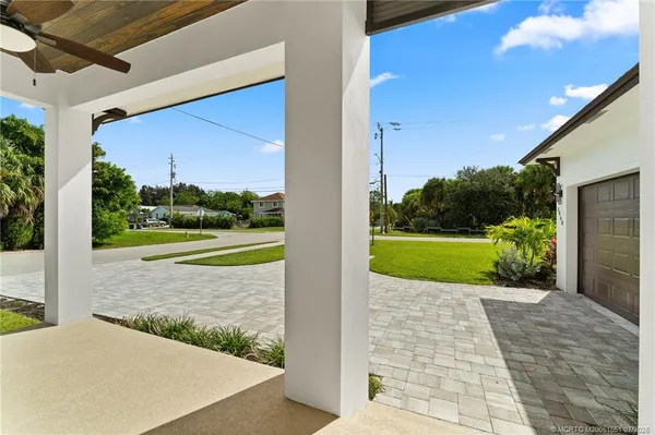 a view of a porch and garden