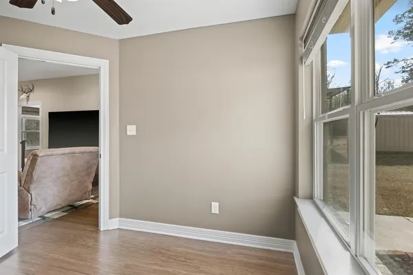 wooden floor and windows in a room