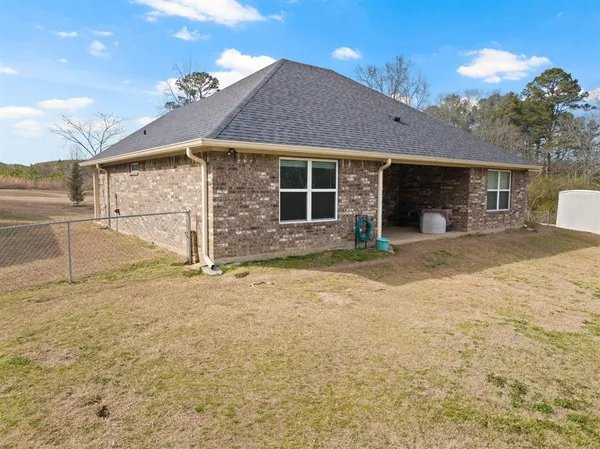 a view of a house with a patio