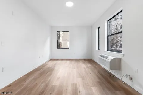 a view of a small space with racks on the wall