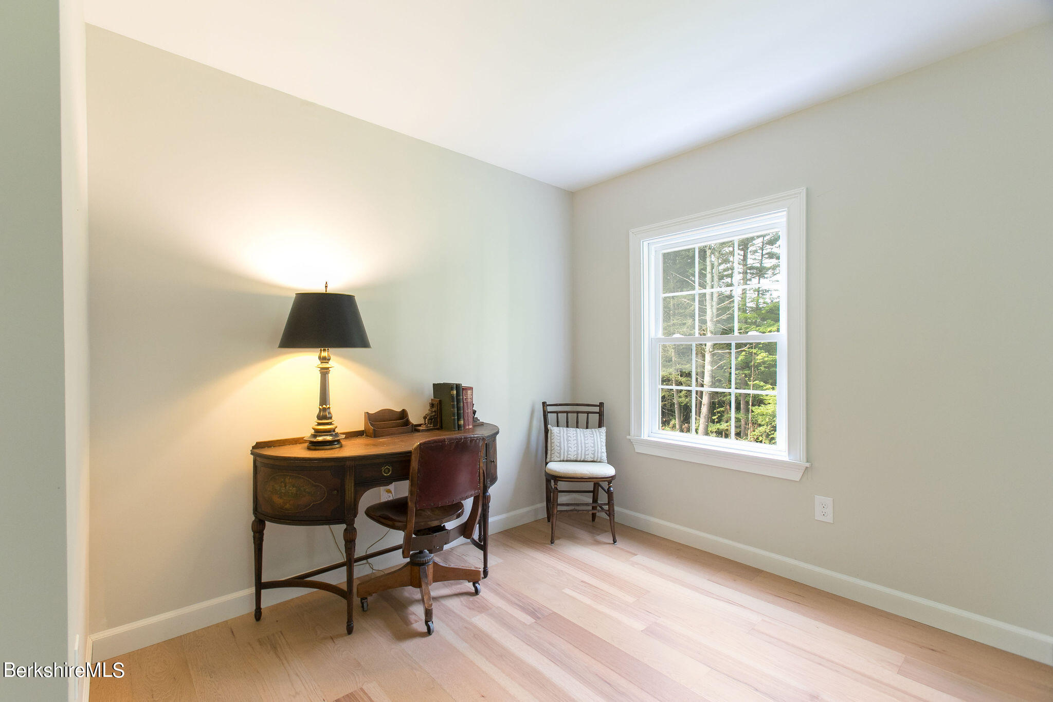 897 Canaan Valley Road New Marlborough, MA 01259 - Photo 33 of 50 a view of a workspace with furniture and a window