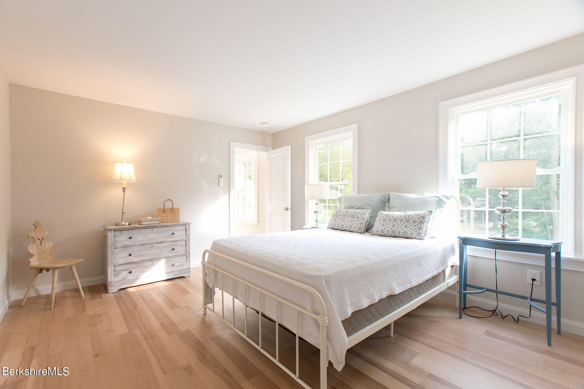 897 Canaan Valley Road New Marlborough, MA 01259 - Photo 36 of 50 a bedroom with a bed and a large window