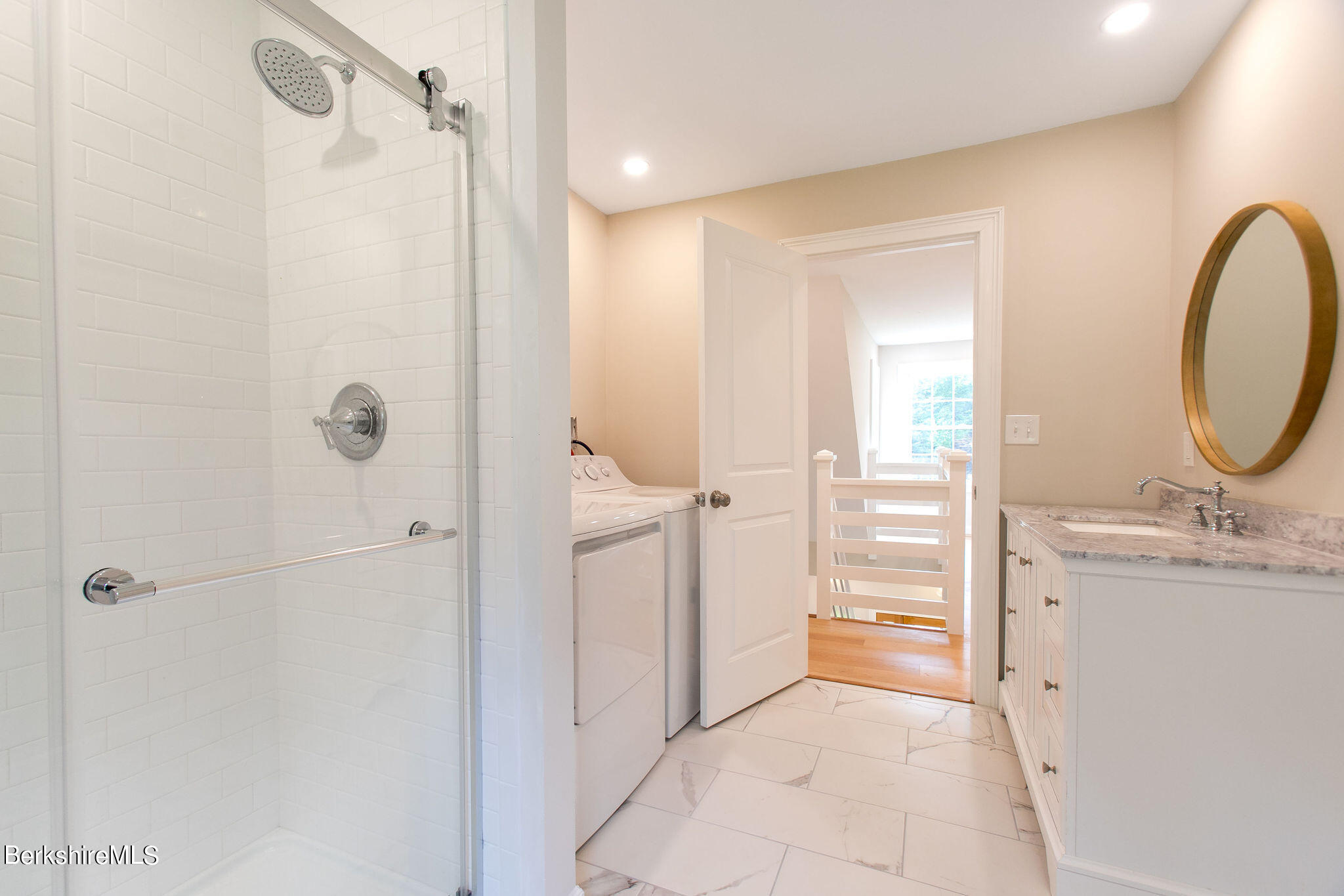 897 Canaan Valley Road New Marlborough, MA 01259 - Photo 38 of 50 a bathroom with a sink and a mirror