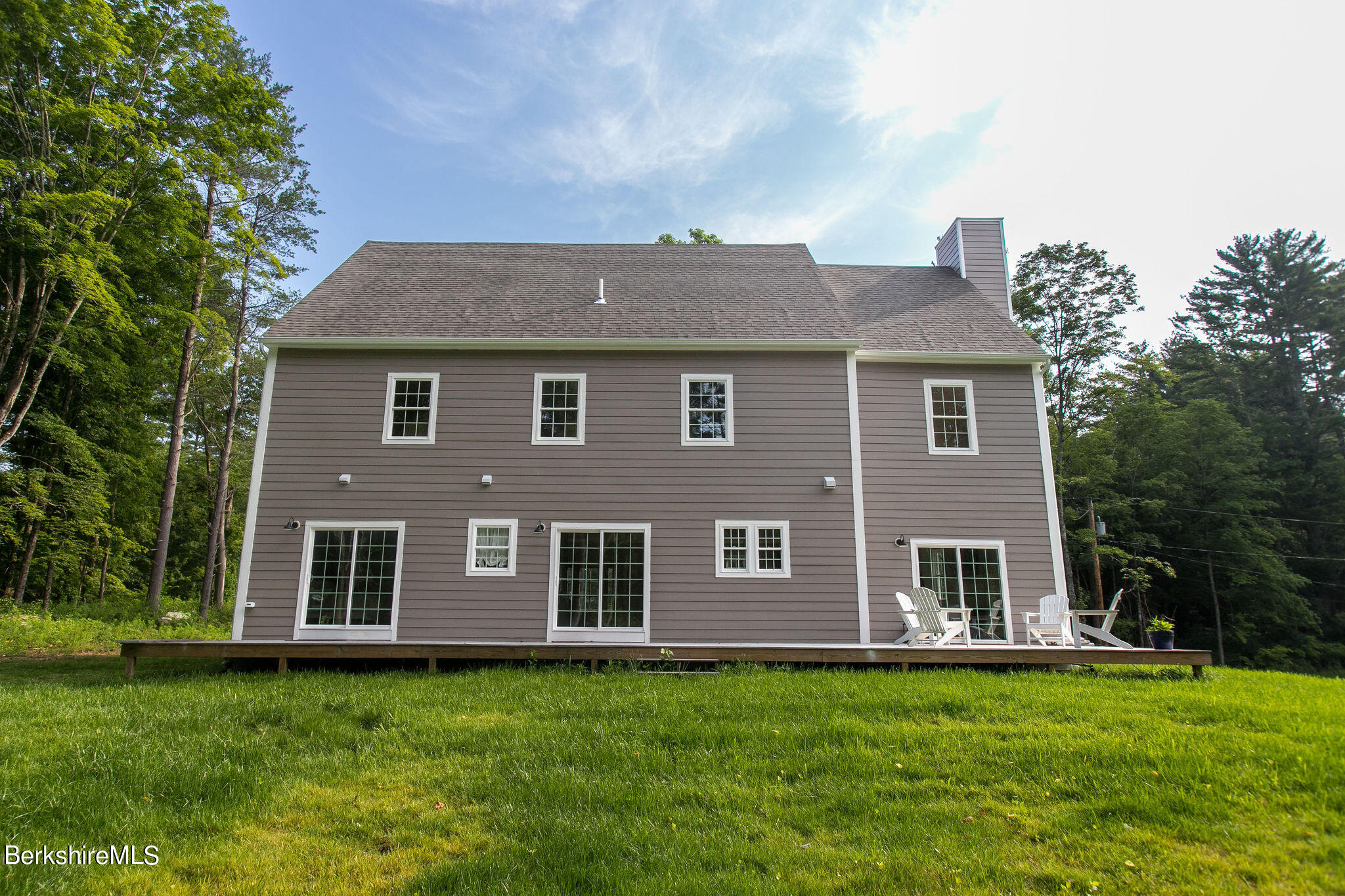 897 Canaan Valley Road New Marlborough, MA 01259 - Photo 40 of 50 a aerial view of a house next to a big yard