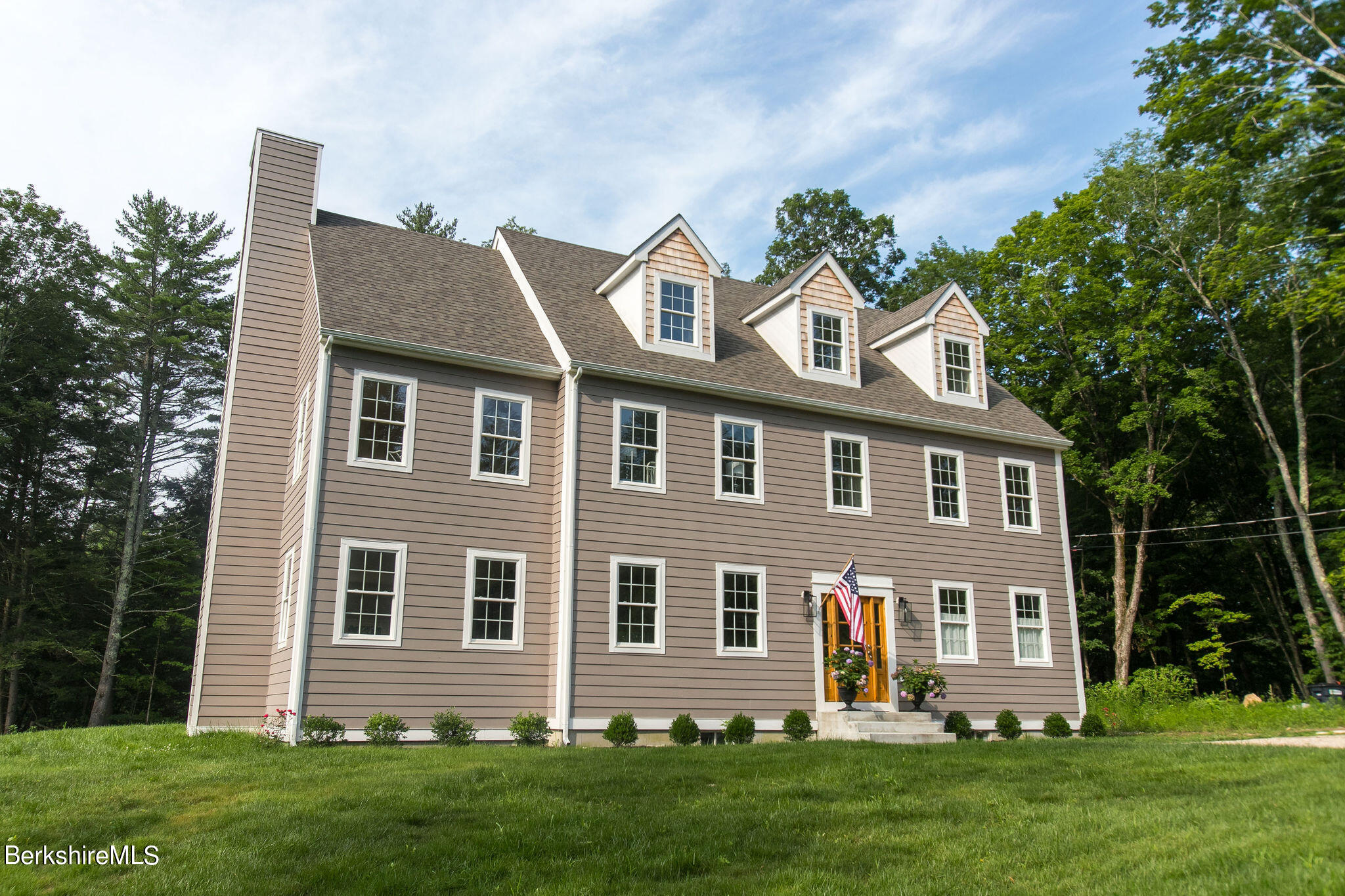 897 Canaan Valley Road New Marlborough, MA 01259 - Photo 43 of 50 a front view of a house with a yard