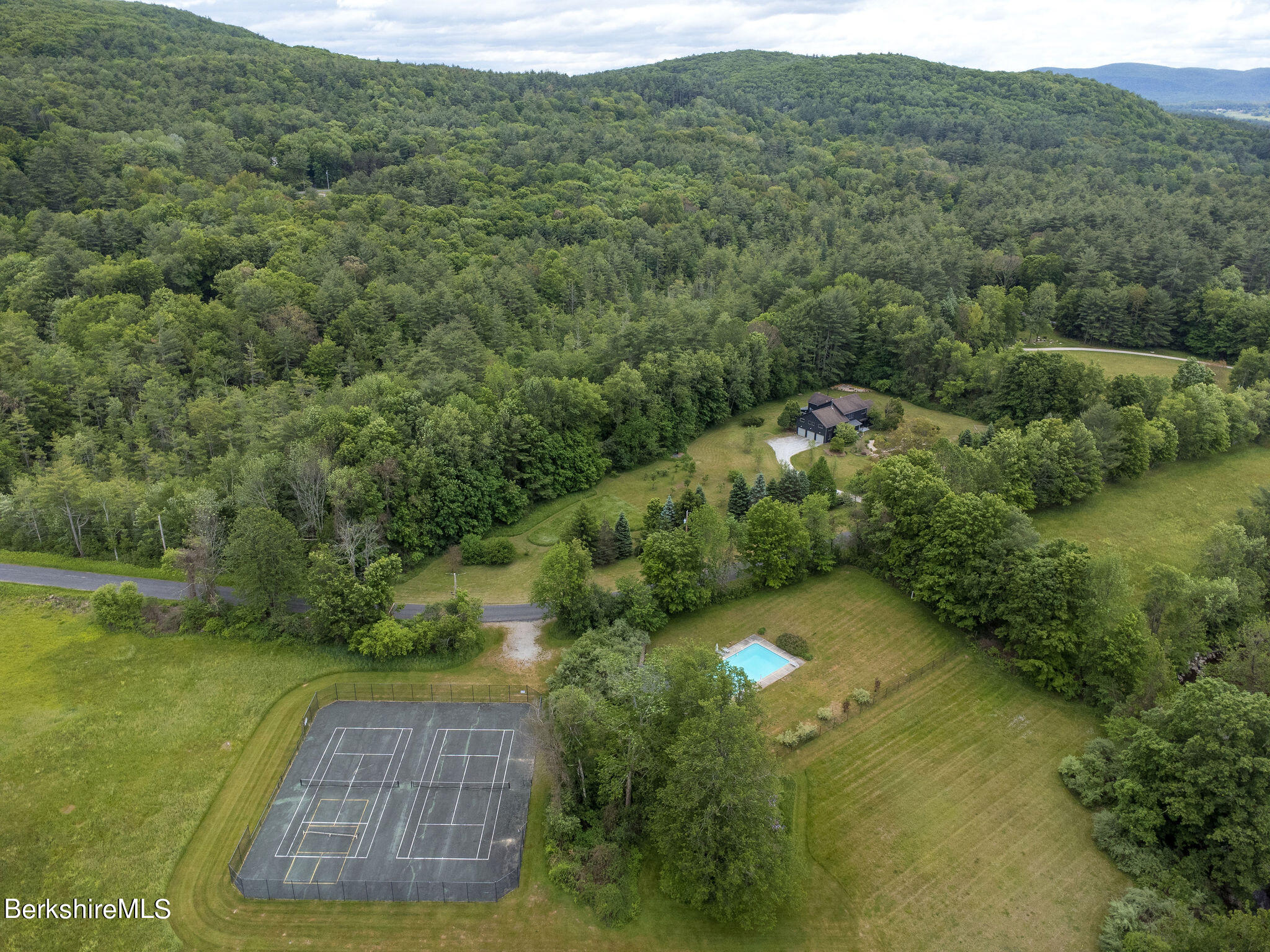 897 Canaan Valley Road New Marlborough, MA 01259 - Photo 46 of 50 a view of a forest with a yard