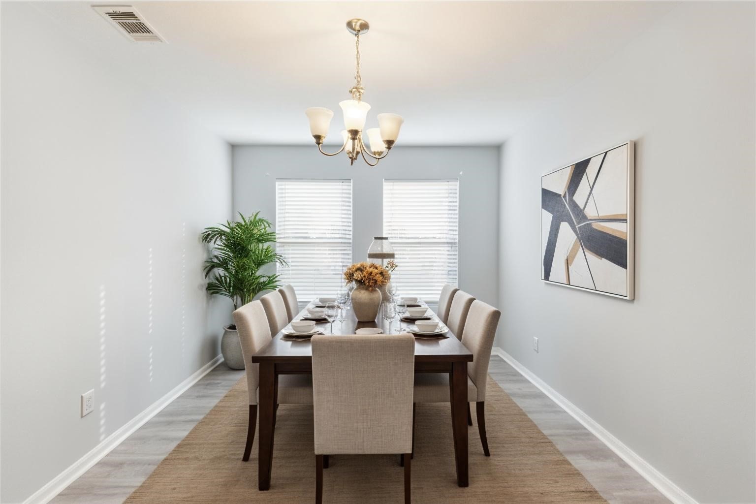 9877 Lace Flower Way Conroe, TX 77385 - Photo 17 of 43 a view of a dining room with furniture window and wooden floor