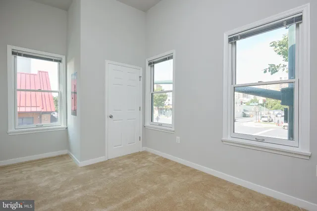 an empty room with windows