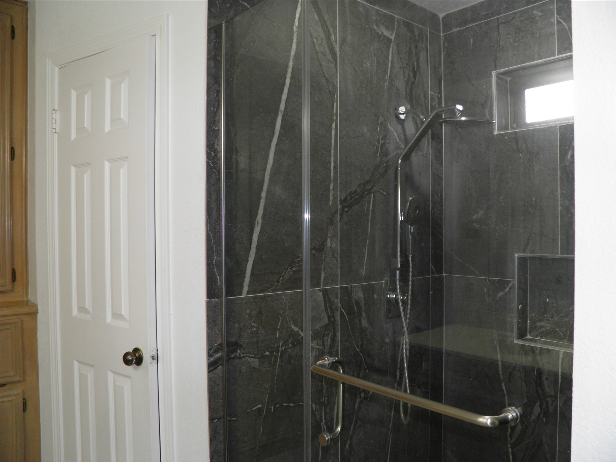 6819 Addicks Clodine Road Houston, TX 77083 - Photo 16 of 28 a bathroom with a shower