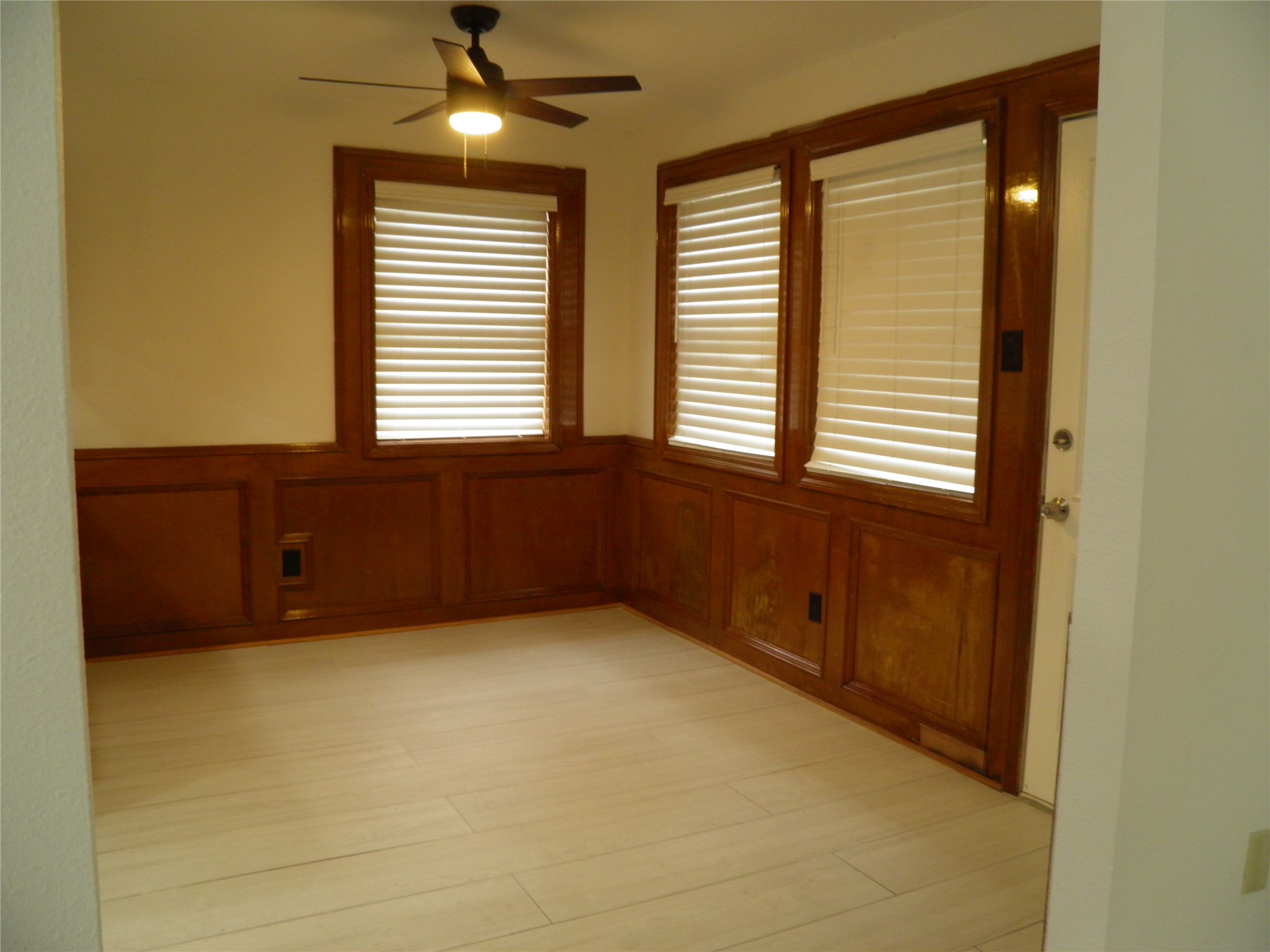 6819 Addicks Clodine Road Houston, TX 77083 - Photo 6 of 28 a view of an empty room with a window