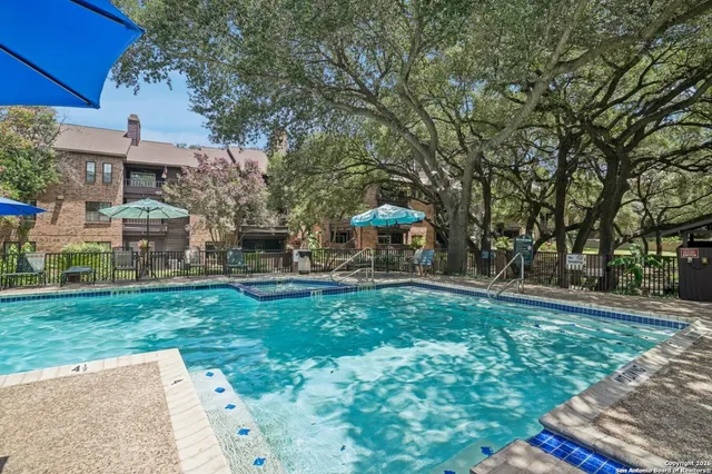 a view of a house with a yard porch and sitting area