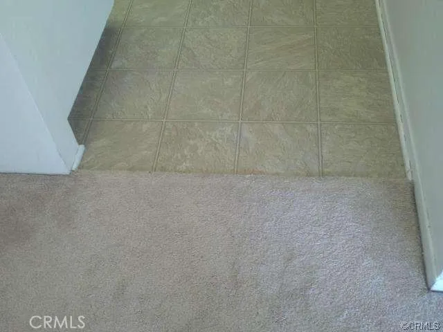 a kitchen with stainless steel appliances a stove a sink and a microwave