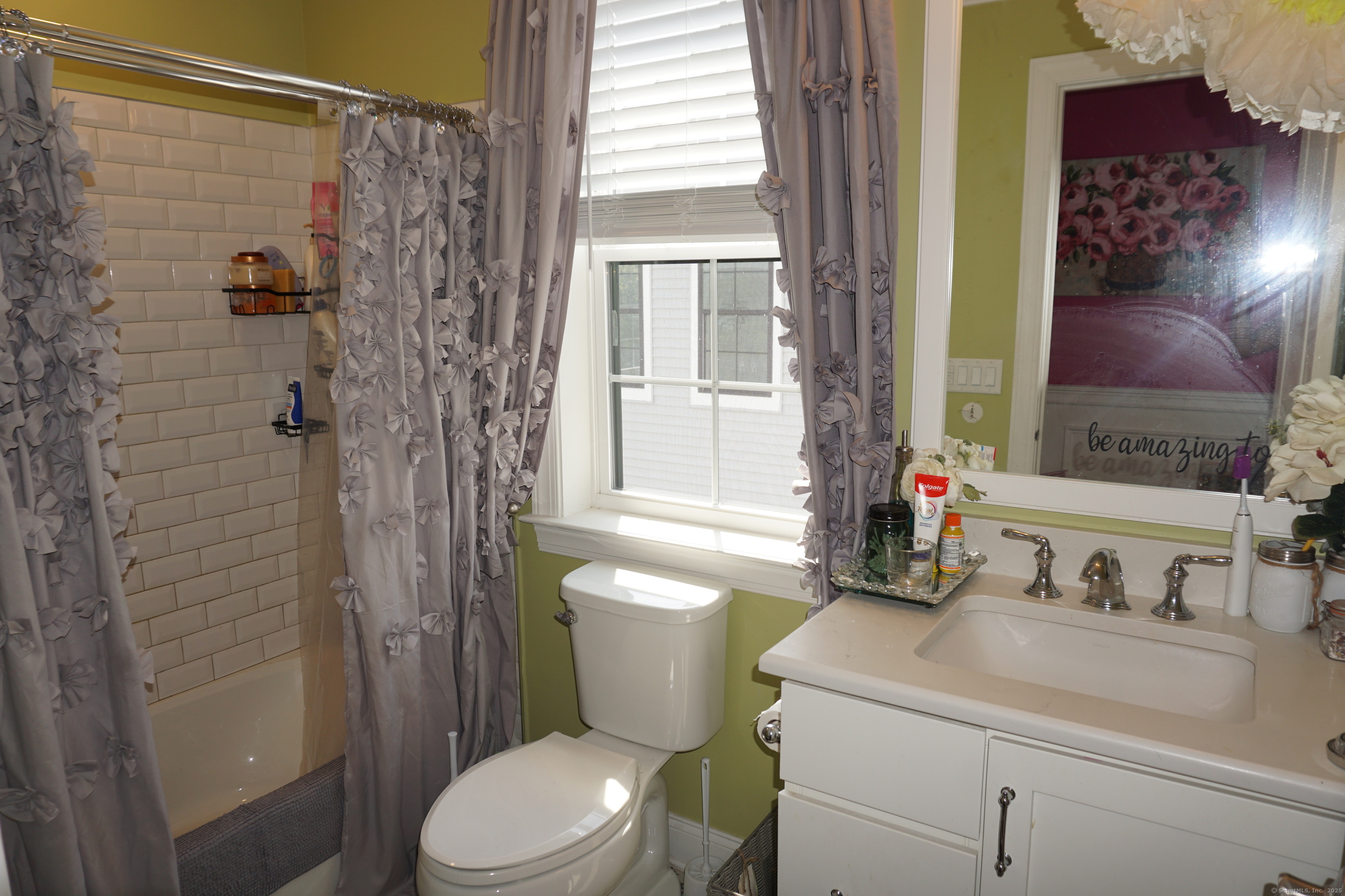 127 Brentwood Circle, Unit 127 Danbury, CT 06810 - Photo 16 of 23 a bathroom with a sink a toilet and shower