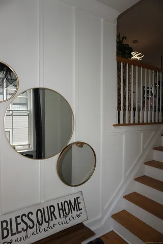 a bathroom with a sink a mirror and bathtub