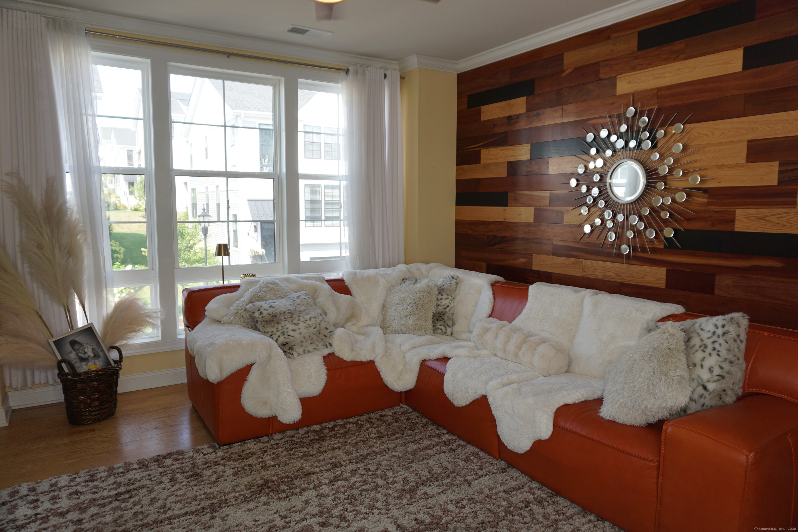 127 Brentwood Circle, Unit 127 Danbury, CT 06810 - Photo 3 of 23 a living room with furniture and wooden floor