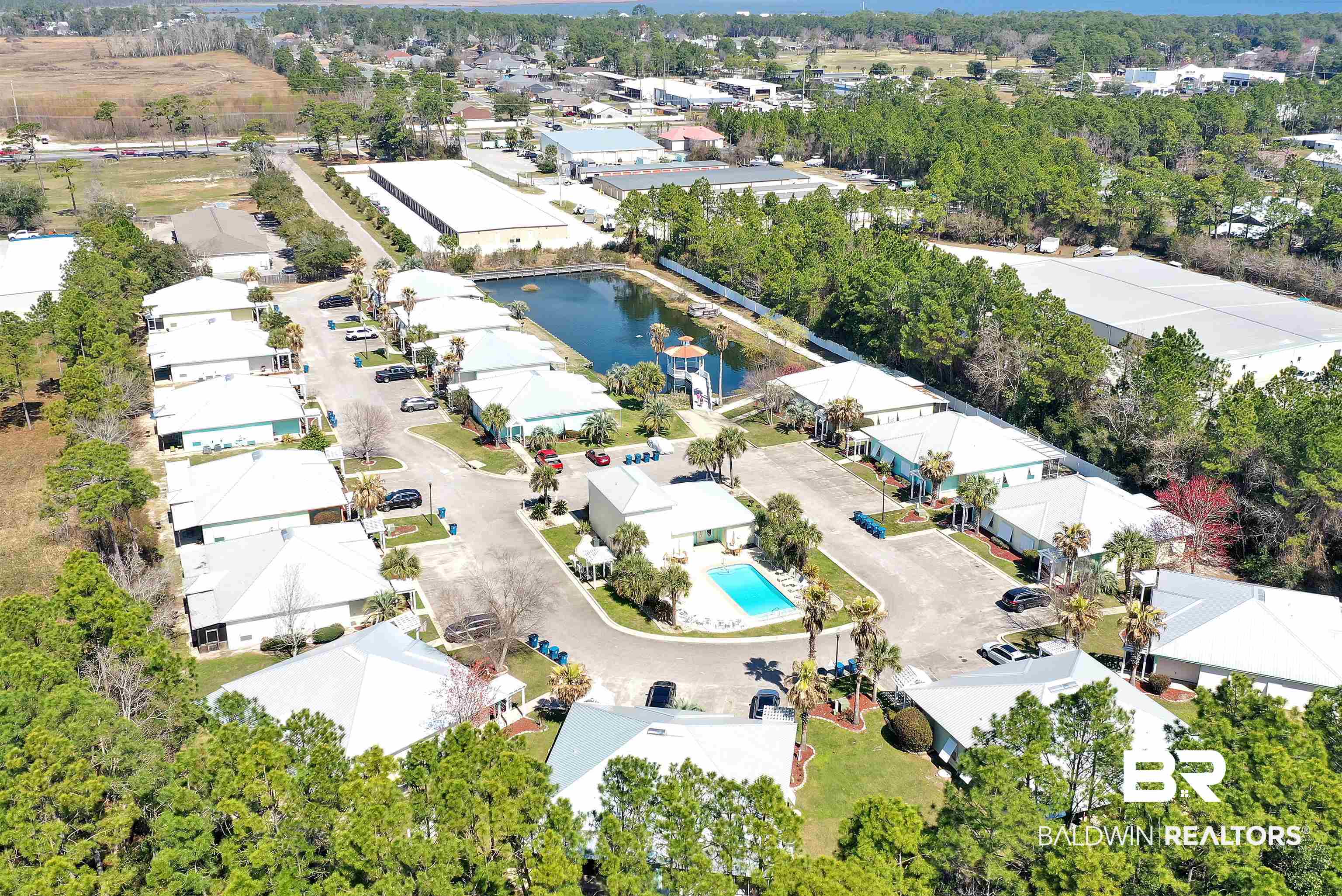 4324 B Lindsey Lane, Unit 4324B Orange Beach, AL 36561 - Photo 32 of 33 Drone / aerial view with a water view and a residential view