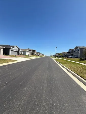 a view of a chairs and table in a patio