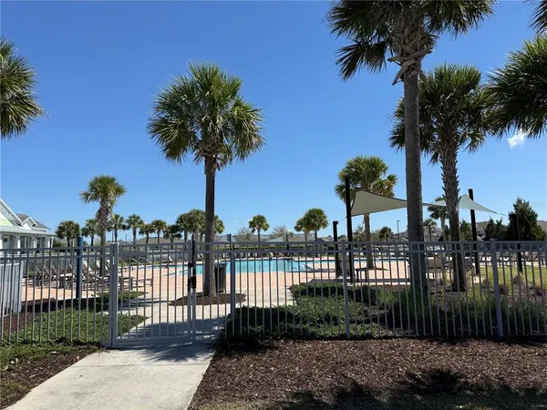 a view of swimming pool with lake view