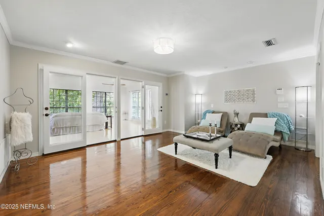 a view of house with garden and a trees