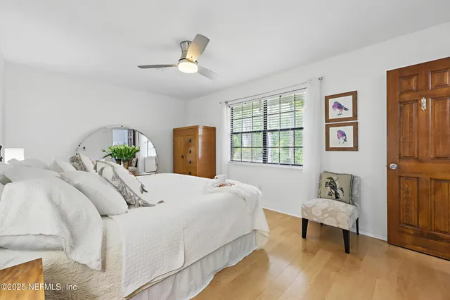 a view of a roof deck with wooden fence and floor
