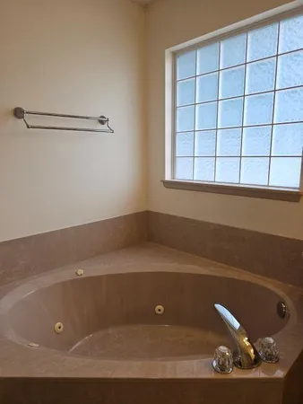 a view of a bathtub in a room