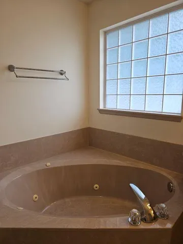 a view of a bathtub in a room