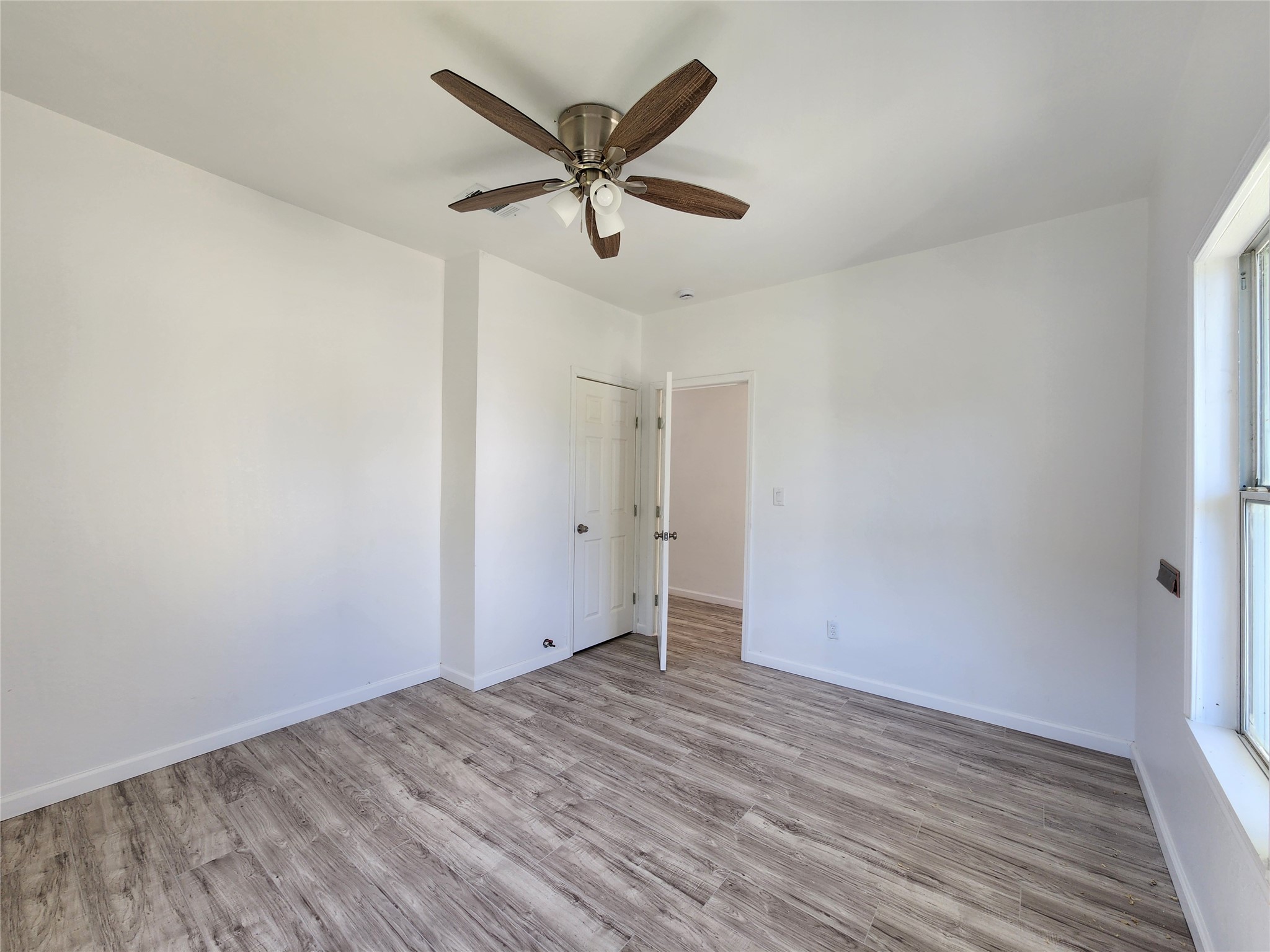 2706 1/2 Berry Street Houston, TX 77004 - Photo 11 of 14 wooden floor in an empty room