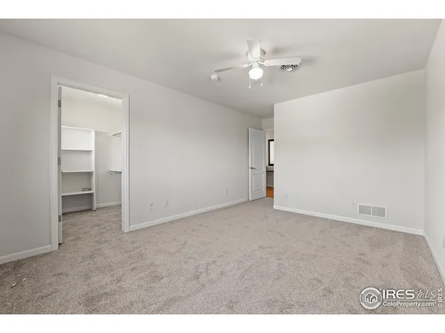 a bathroom with a mirror and a shower