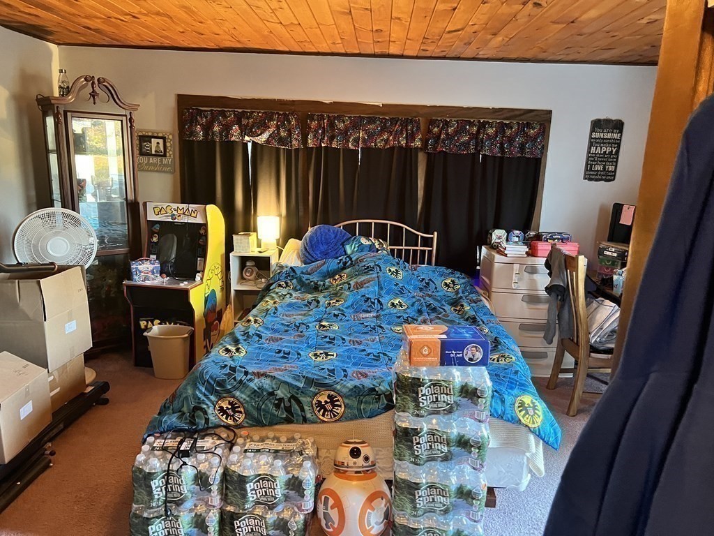 25 Main Road Phillipston, MA 01331 - Photo 20 of 42 a bed room with furniture and a wooden floor