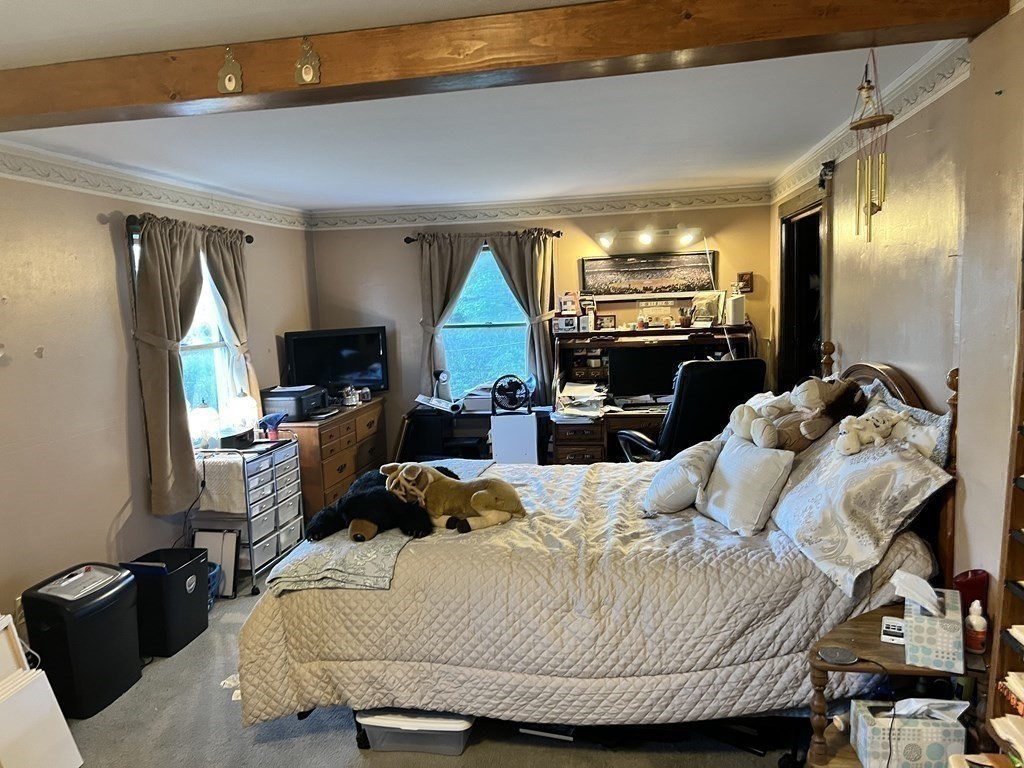 25 Main Road Phillipston, MA 01331 - Photo 25 of 42 a bedroom with a bed and a television