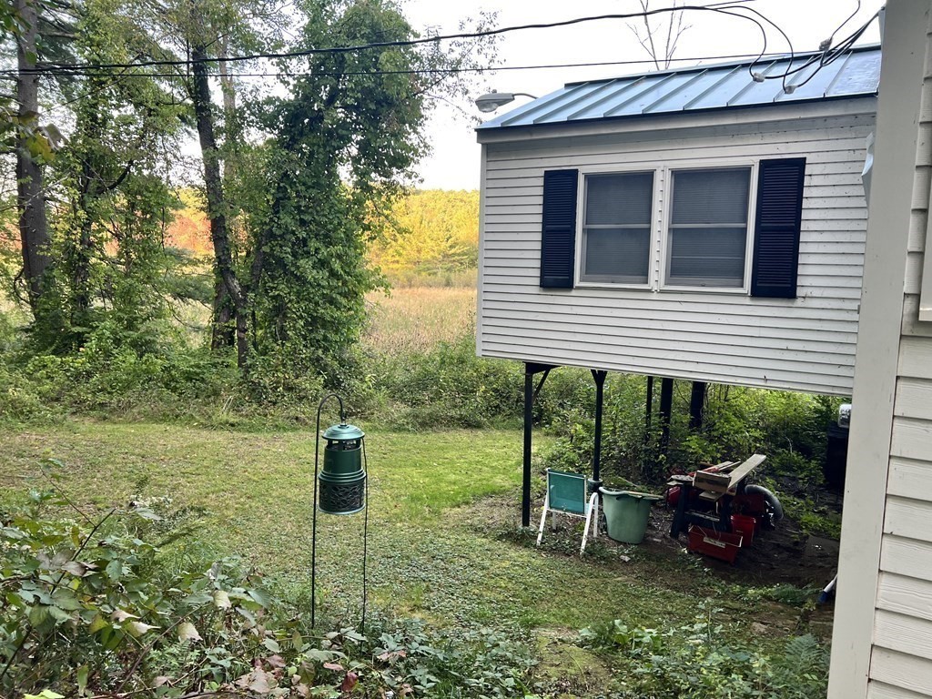 25 Main Road Phillipston, MA 01331 - Photo 3 of 42 a house view with a backyard space
