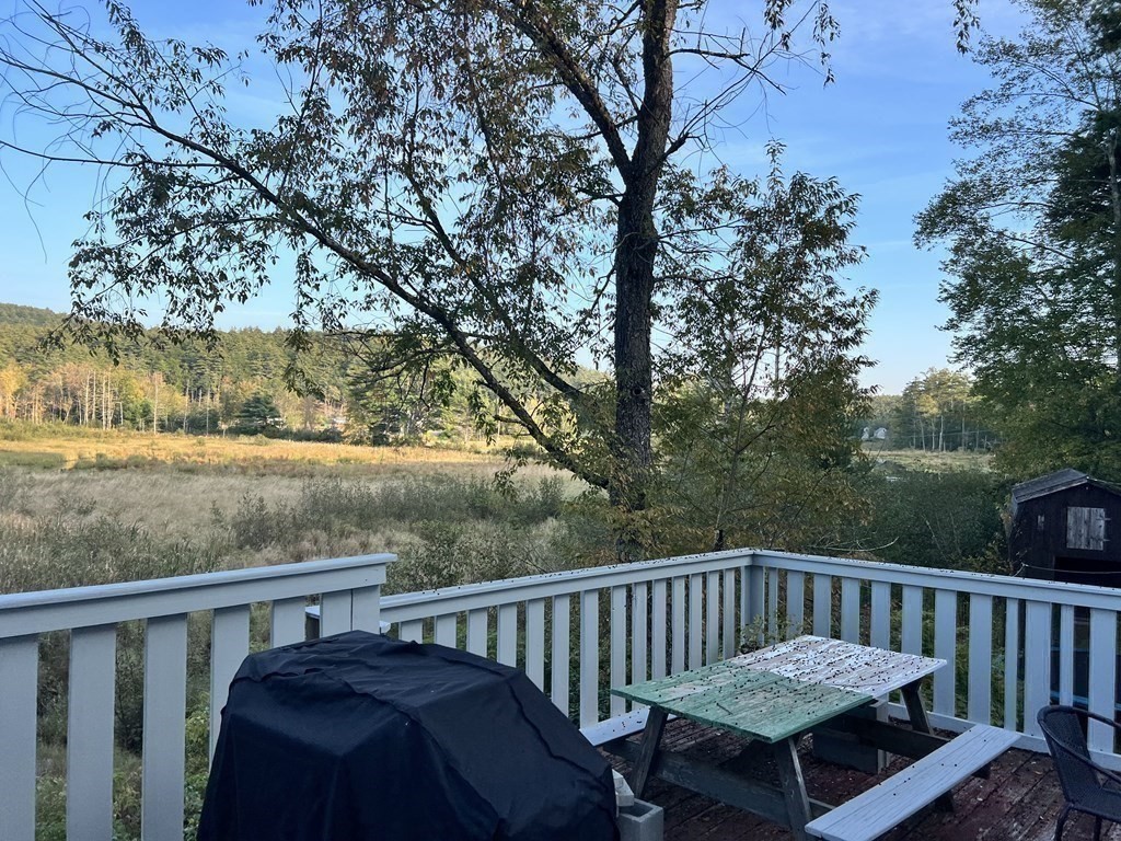 25 Main Road Phillipston, MA 01331 - Photo 35 of 42 a view of a wooden bench on a roof deck