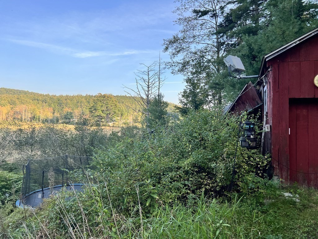 25 Main Road Phillipston, MA 01331 - Photo 8 of 42 a view of a city from a yard