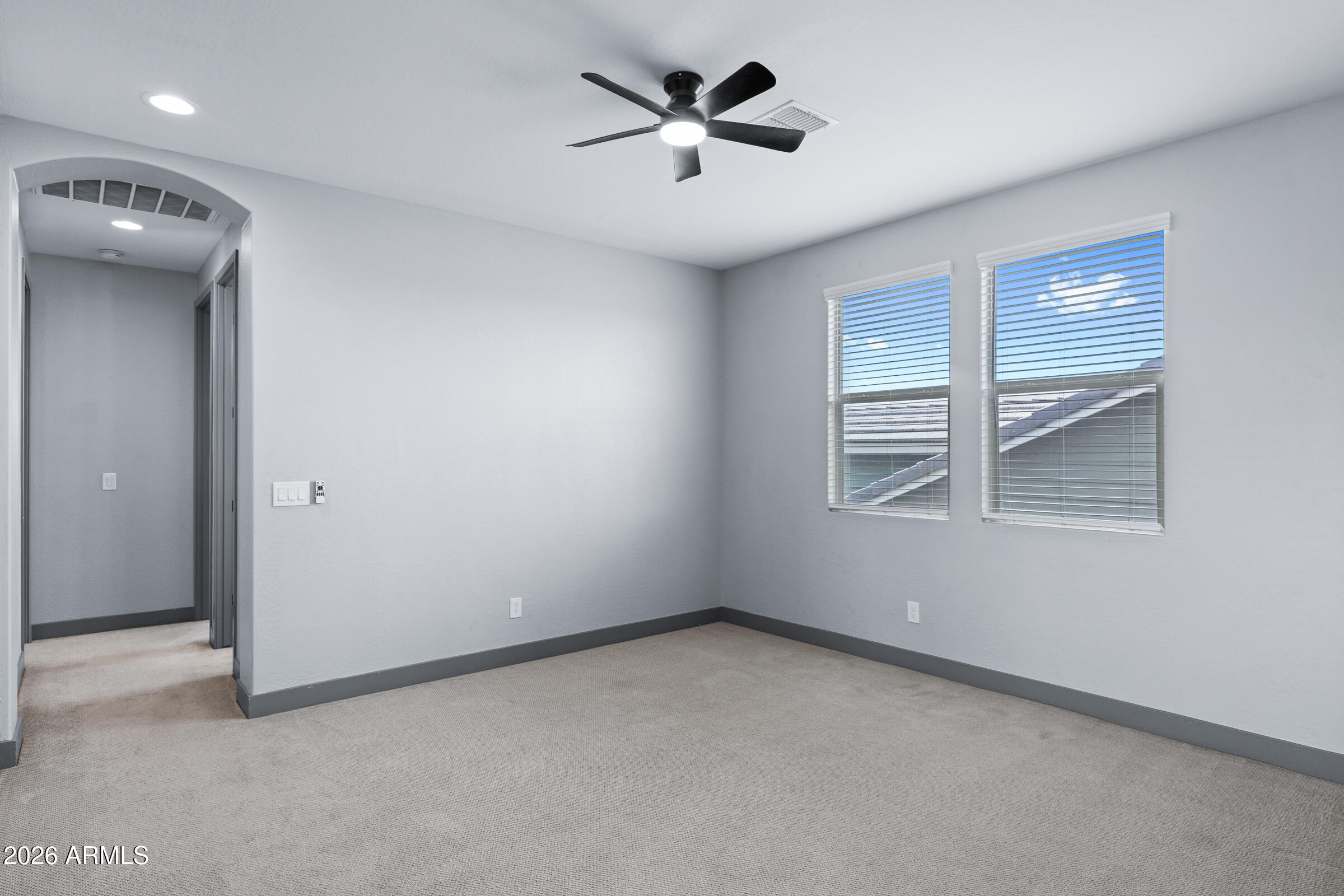 3900 East Appaloosa Road Gilbert, AZ 85296 - Photo 22 of 38 a view of a livingroom with a ceiling fan and window
