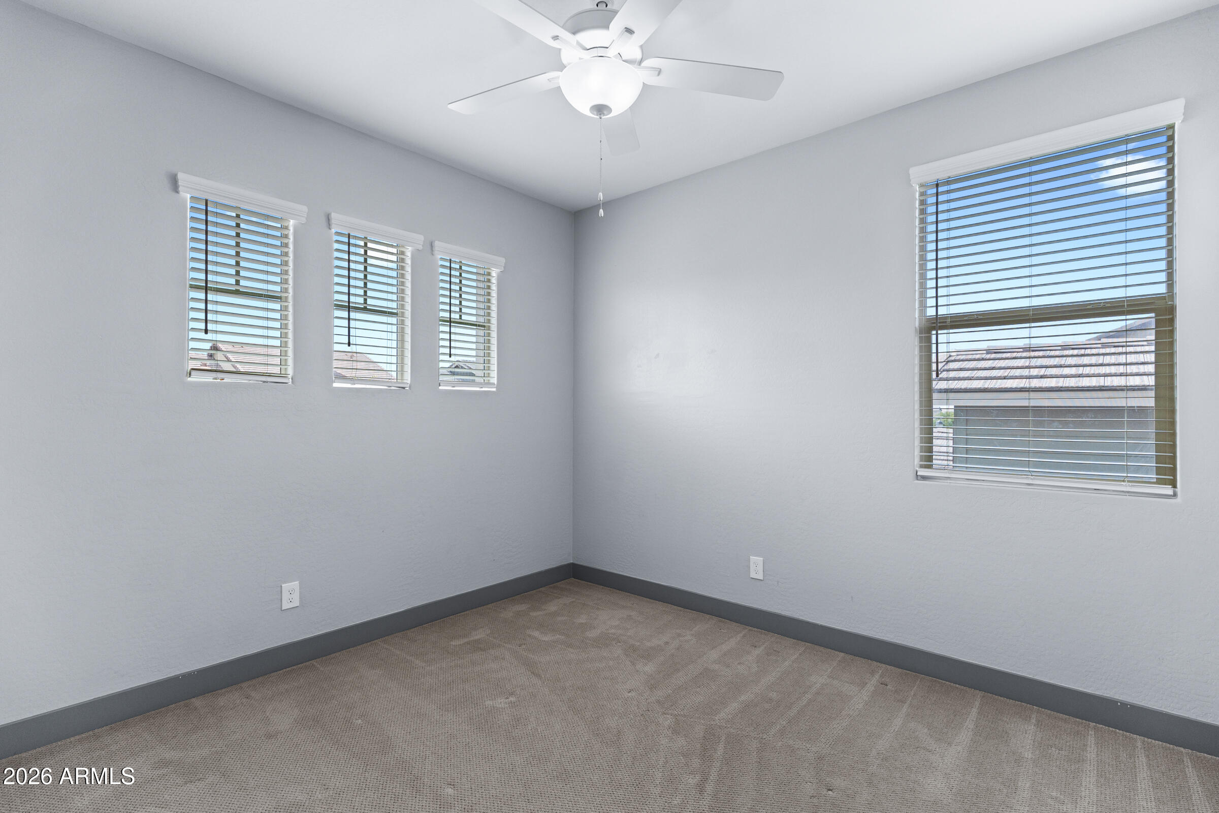 3900 East Appaloosa Road Gilbert, AZ 85296 - Photo 28 of 38 a view of an empty room with a window